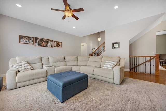 living area with recessed lighting, wood finished floors, and baseboards