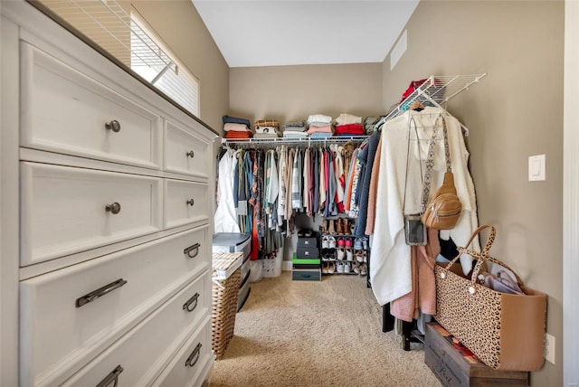 spacious closet with visible vents and light carpet