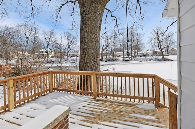 view of snow covered deck