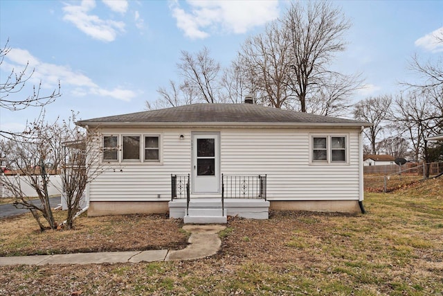 view of front of house with fence