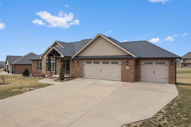 craftsman inspired home with a garage, driveway, brick siding, and a front yard