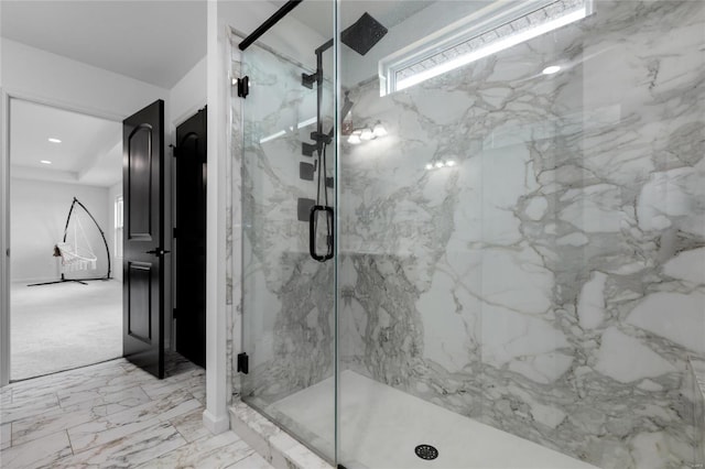 full bath with a marble finish shower, recessed lighting, and marble finish floor