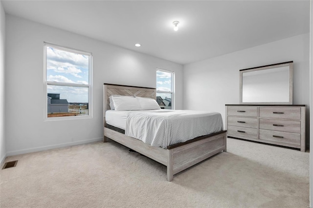 bedroom featuring carpet flooring, recessed lighting, baseboards, and visible vents