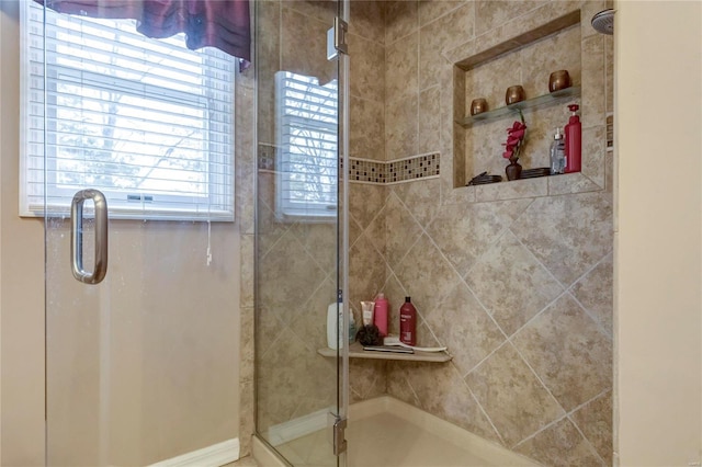 bathroom with a stall shower