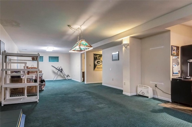 interior space with baseboards and carpet floors