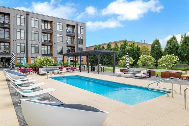 community pool featuring a patio area and a pergola