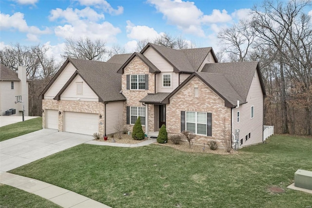 craftsman-style home with central AC unit, a garage, a shingled roof, brick siding, and a front lawn