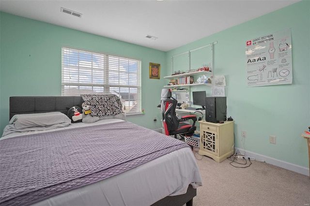 bedroom featuring light carpet, visible vents, and baseboards