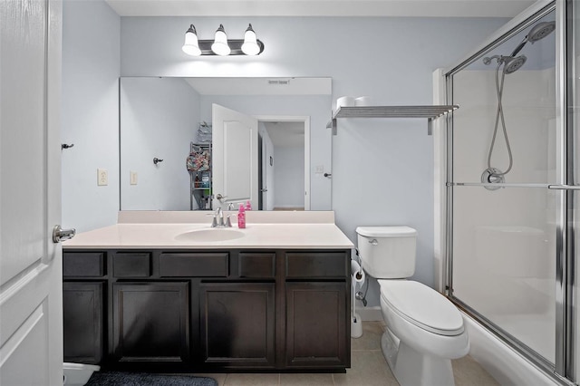 full bath featuring visible vents, toilet, a stall shower, vanity, and tile patterned floors