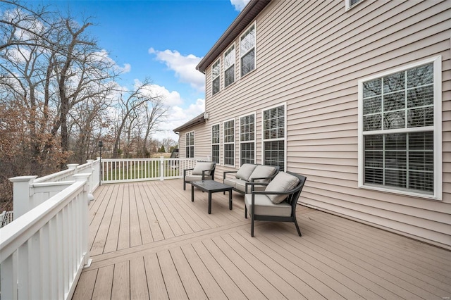 deck featuring an outdoor living space