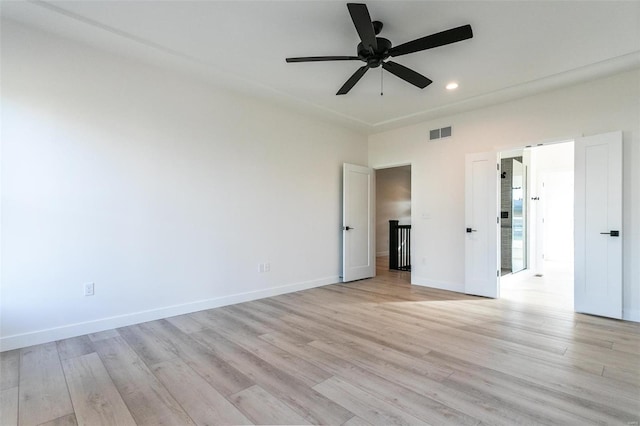 spare room with visible vents, baseboards, a ceiling fan, light wood-style flooring, and recessed lighting