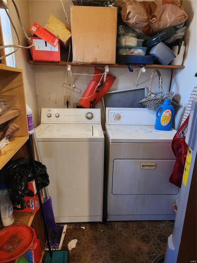 laundry room with laundry area and washer and clothes dryer