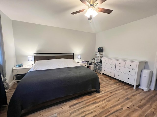 bedroom with ceiling fan and wood finished floors