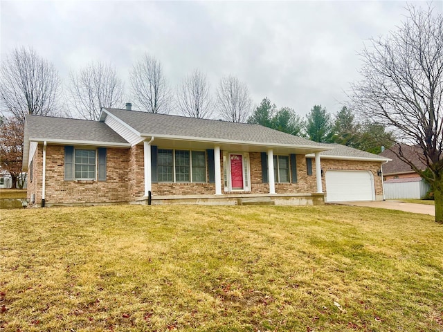 ranch-style home with concrete driveway, brick siding, an attached garage, and a front lawn