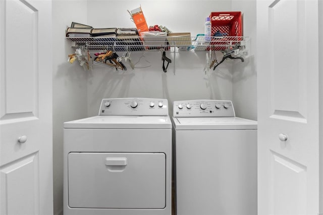 clothes washing area with laundry area and washing machine and dryer