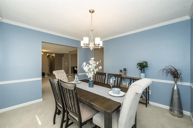 dining area with ornamental molding, a notable chandelier, and light colored carpet