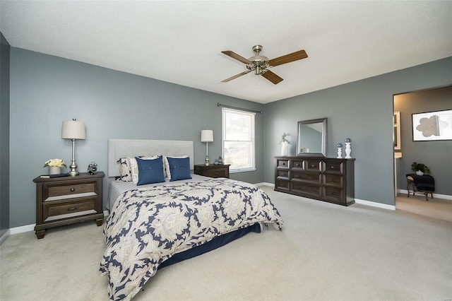 bedroom featuring carpet, a ceiling fan, and baseboards