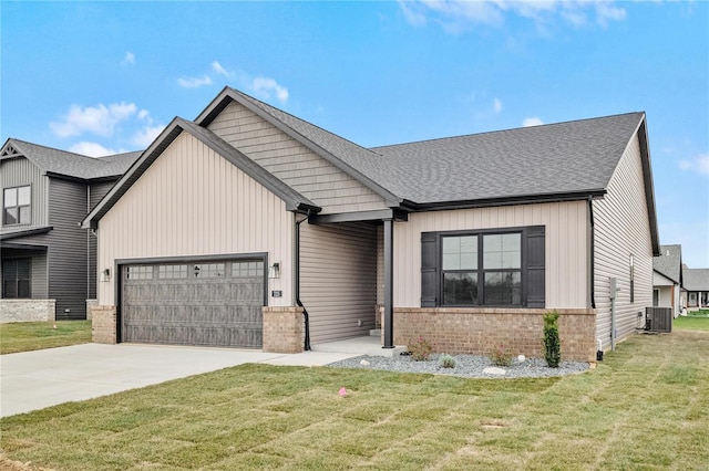 modern farmhouse style home featuring brick siding, central air condition unit, a front yard, a garage, and driveway