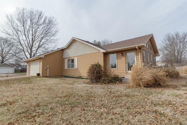 view of property exterior featuring a garage