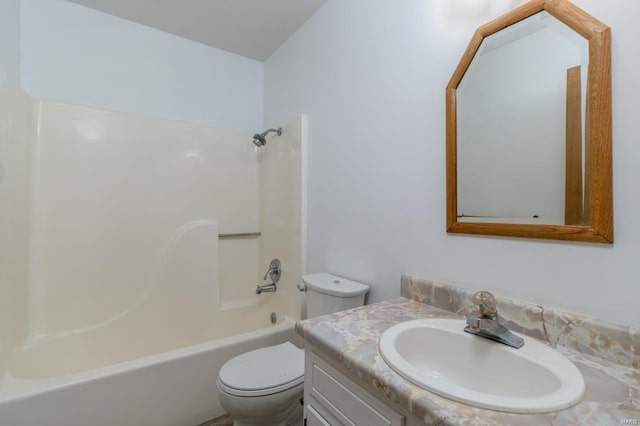 full bathroom with shower / bath combination, vanity, and toilet