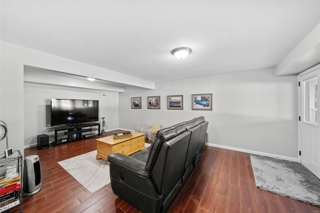 living room featuring dark wood-style floors and baseboards