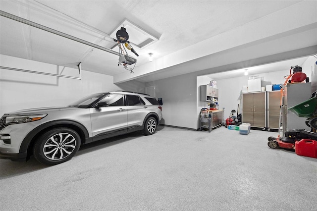 garage featuring a garage door opener