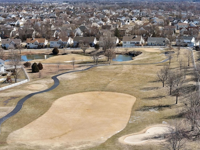 aerial view featuring a residential view and a water view