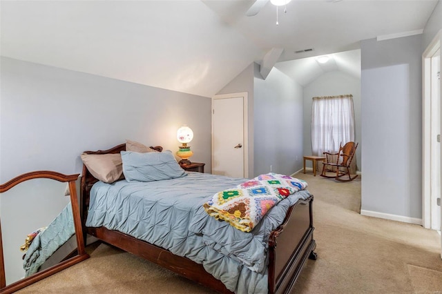 carpeted bedroom featuring lofted ceiling, ceiling fan, visible vents, and baseboards