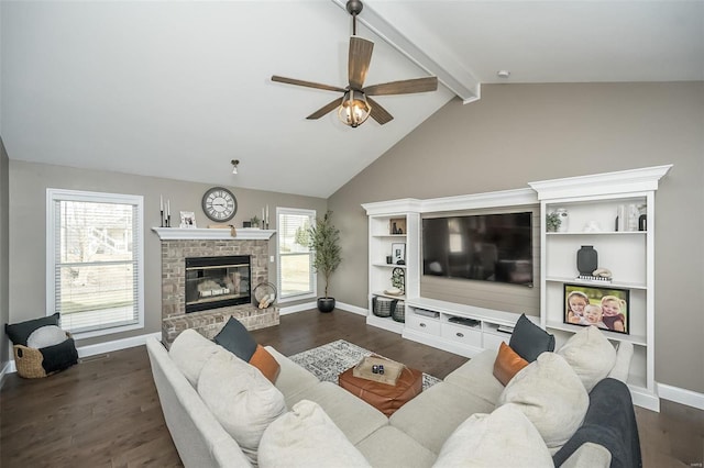 living area featuring dark wood-style floors, a brick fireplace, plenty of natural light, and vaulted ceiling with beams