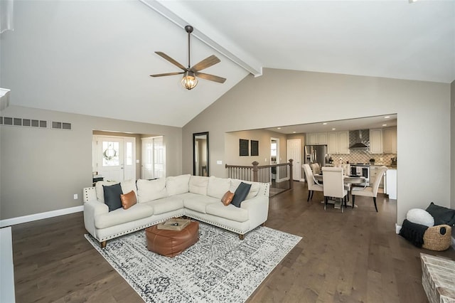 living room featuring dark wood-style floors, baseboards, high vaulted ceiling, and beam ceiling