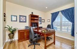 office space featuring light wood-type flooring