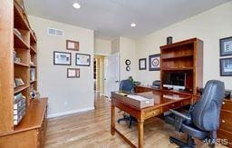 office space with recessed lighting, baseboards, and wood finished floors