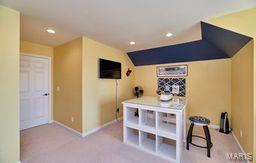 interior space featuring recessed lighting, baseboards, and carpet floors