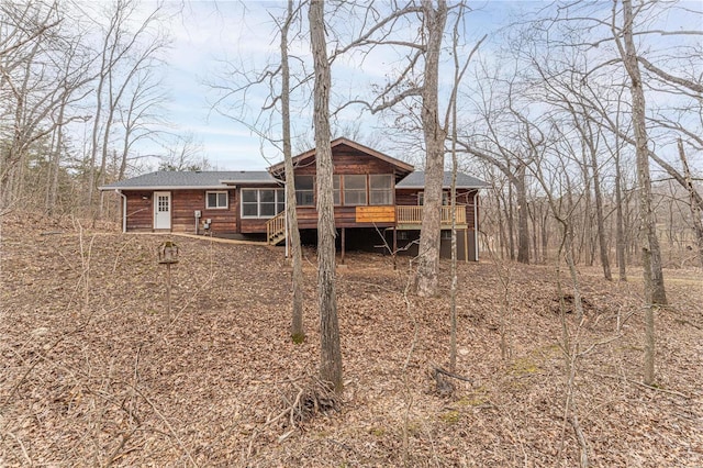 view of front of home with a sunroom