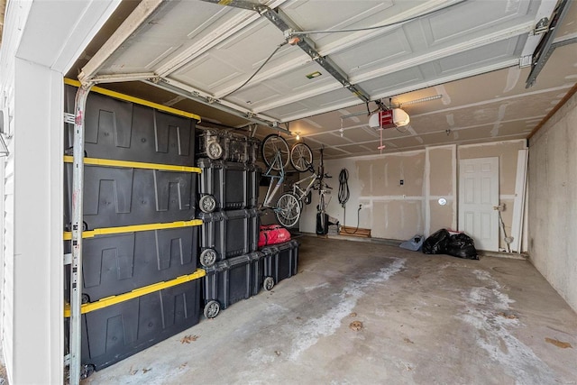 garage featuring a garage door opener