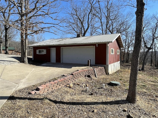 garage featuring driveway