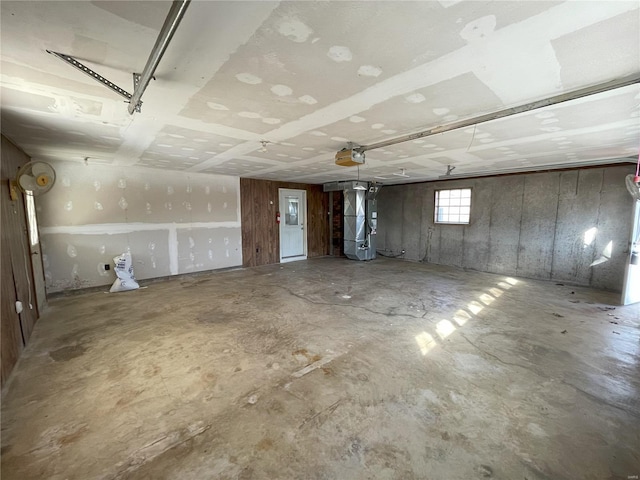 garage with heating unit and a garage door opener