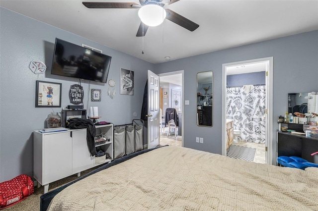 bedroom with carpet, a ceiling fan, and connected bathroom