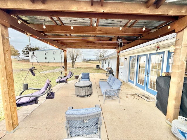 view of patio / terrace featuring french doors