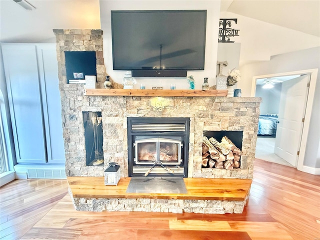 interior details featuring visible vents and wood finished floors