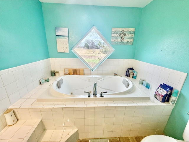 bathroom with a jetted tub