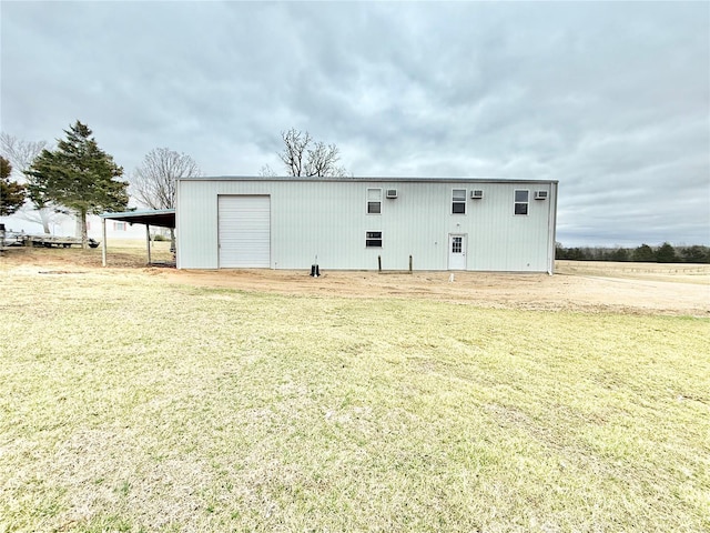 view of pole building featuring a yard