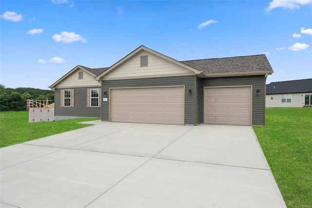 single story home featuring a garage, a front lawn, concrete driveway, and roof with shingles