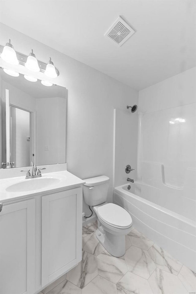 full bathroom with toilet, shower / bath combination, vanity, visible vents, and marble finish floor