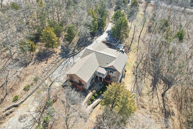 aerial view featuring a view of trees