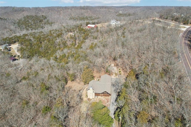 aerial view featuring a view of trees