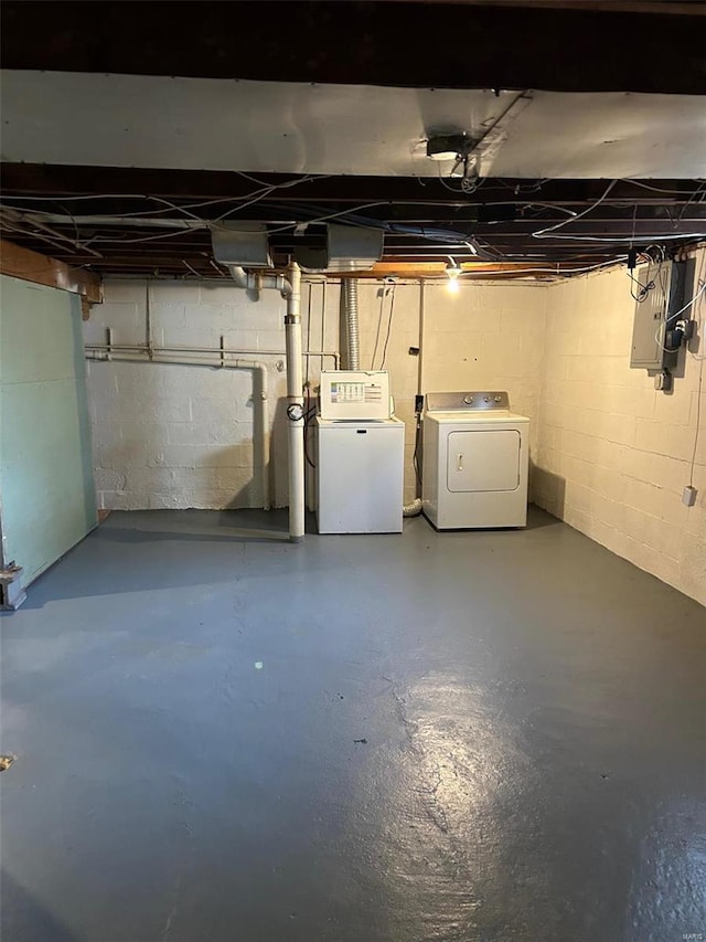 unfinished below grade area with washer and dryer