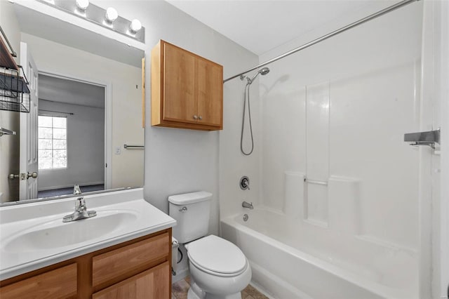 bathroom featuring vanity, toilet, and shower / washtub combination