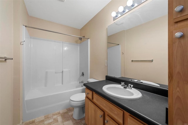 full bathroom featuring shower / bath combination, toilet, and vanity