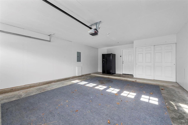 parking deck featuring electric panel and a garage door opener